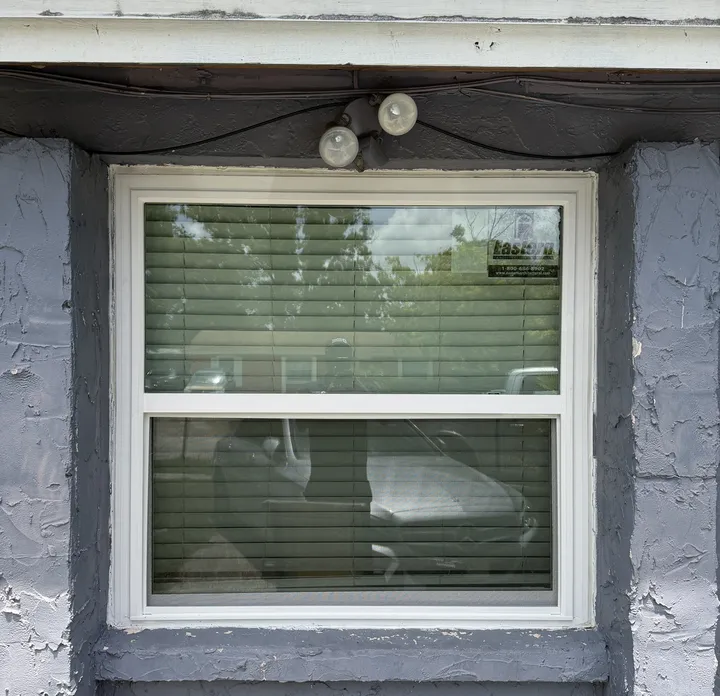 New impact window installed in a Tampa block home